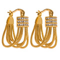 A pair of gold hoop earrings with a rectangular top set with clear rhinestones, from which five textured gold chains dangle, shown on a plain white background.